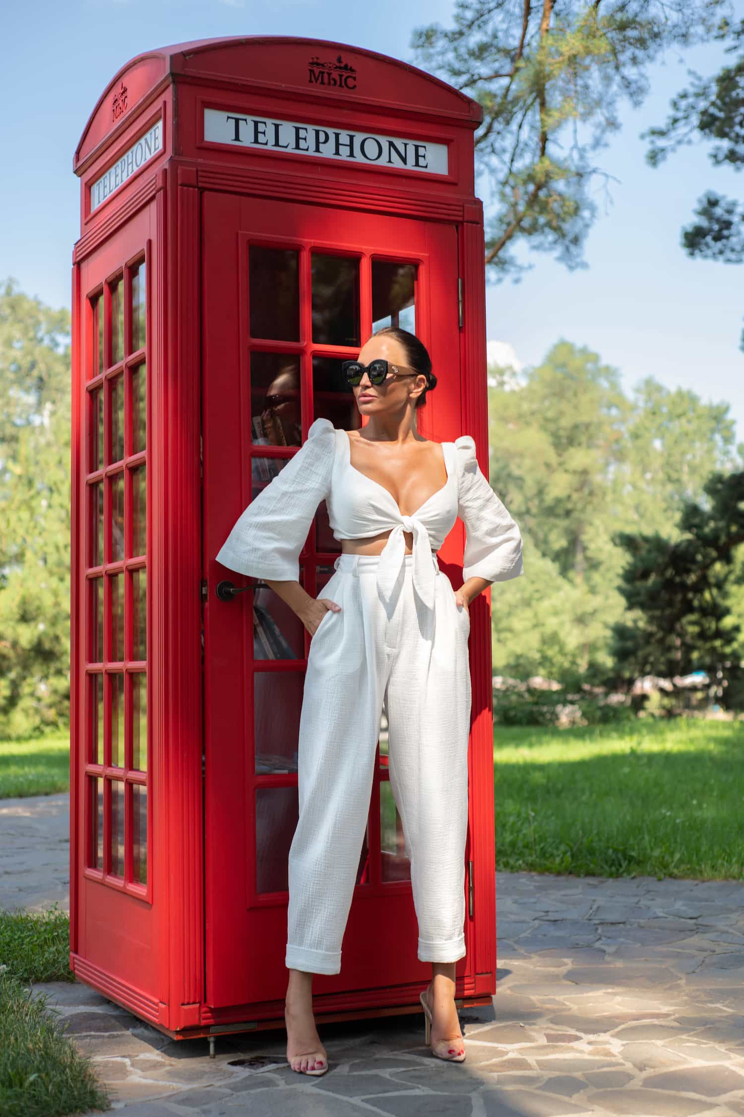 White muslin suit with cropped trousers and drawstring top